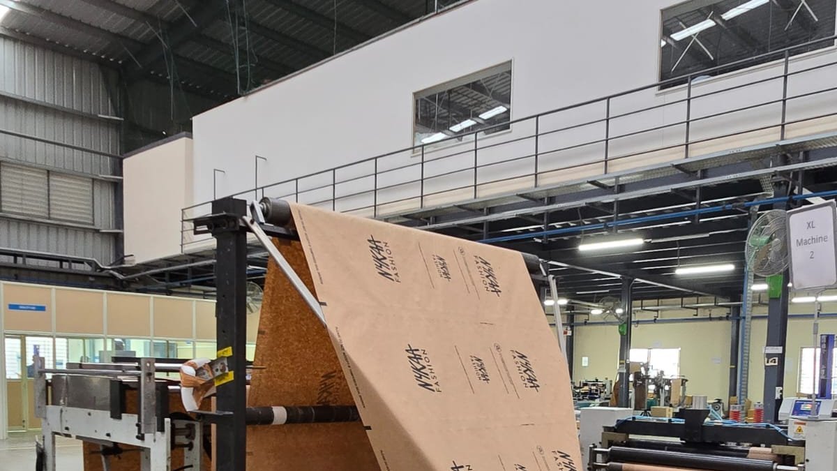 Kraft paper roll being tested on the factory floor